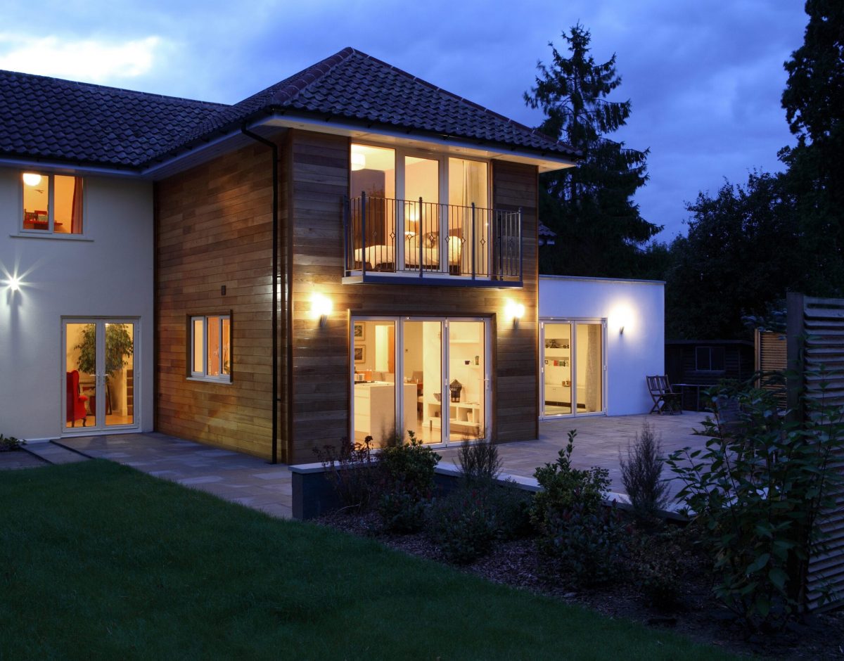 Large house illuminated in the evening